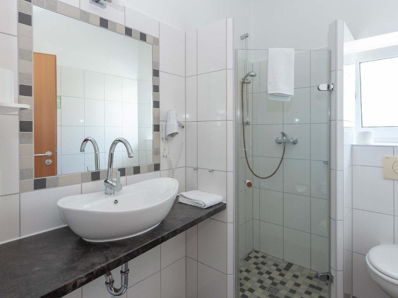 Hotel Herrlichkeit Dornum Janssen Buitenkant foto